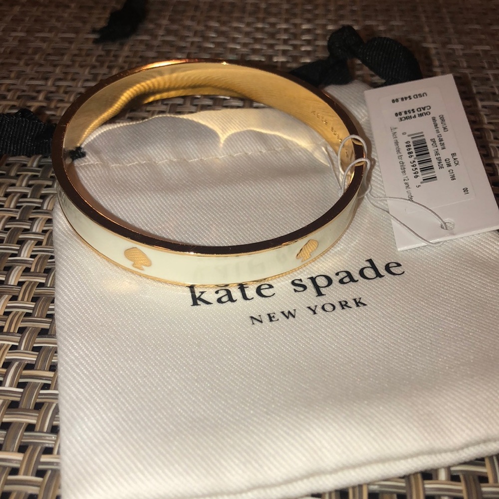 White and gold Kate spade bangle